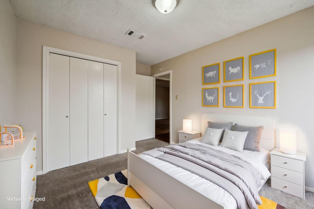 Second bedroom with window at Bay Colony Apartments