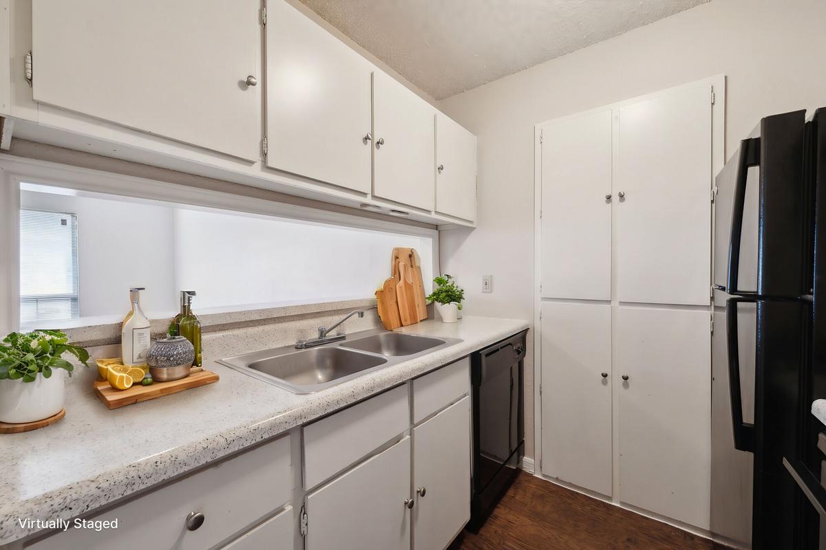 Kitchen cabinetry and counter space at Bay Colony Apartments