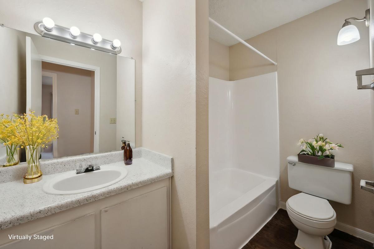Bathroom with vanity at Bay Colony Apartments