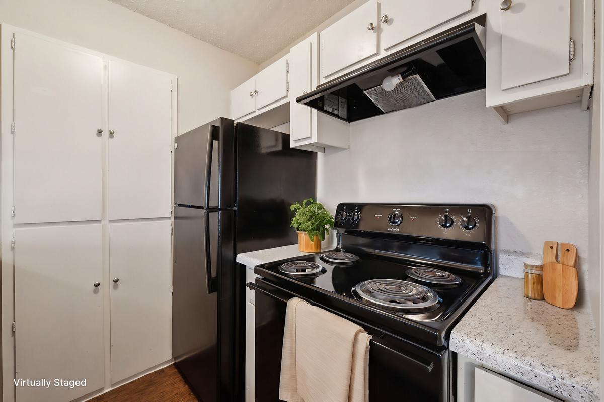 Kitchen with full appliance package at Bay Colony Apartments