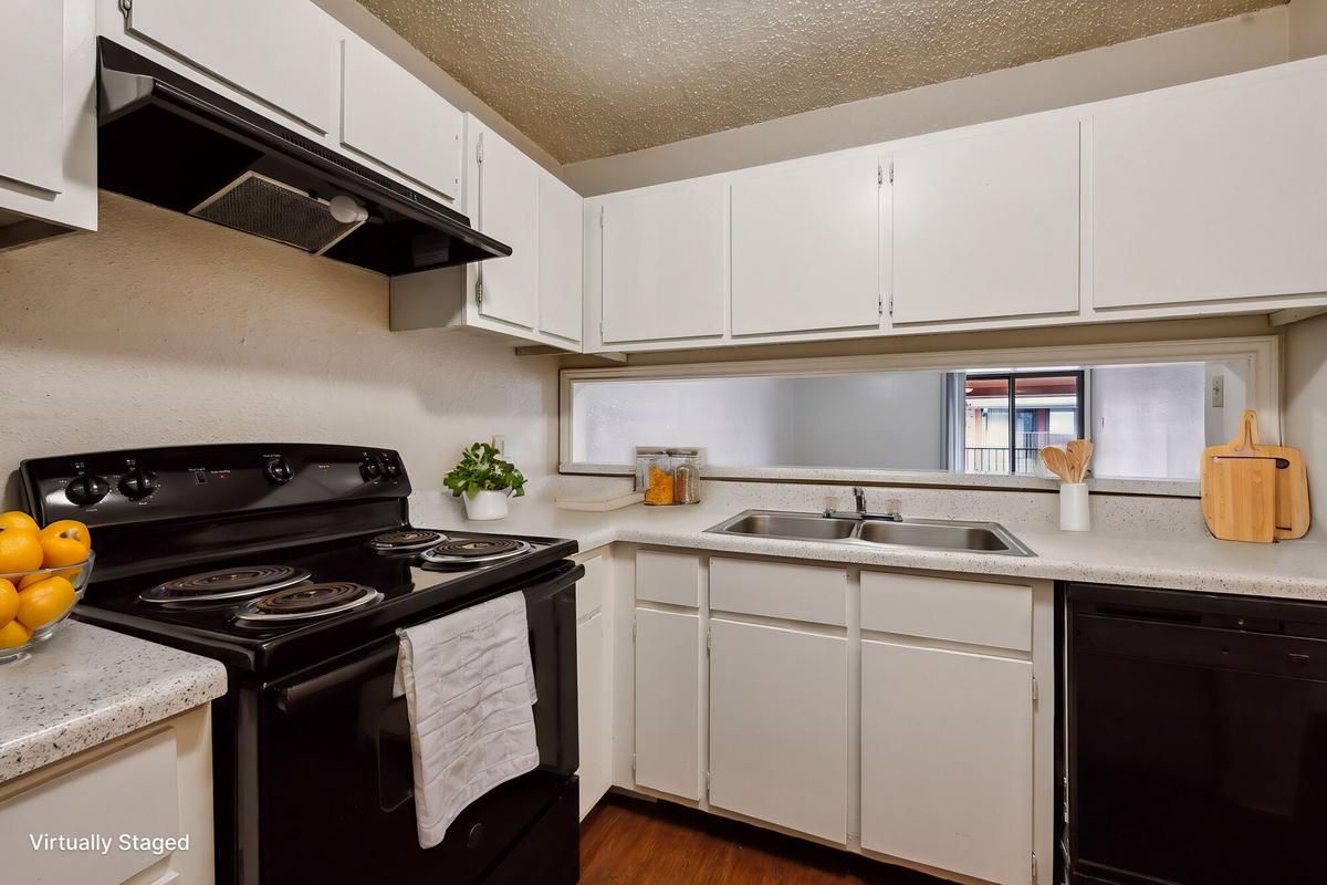 Kitchen and dining area at Bay Colony Apartments